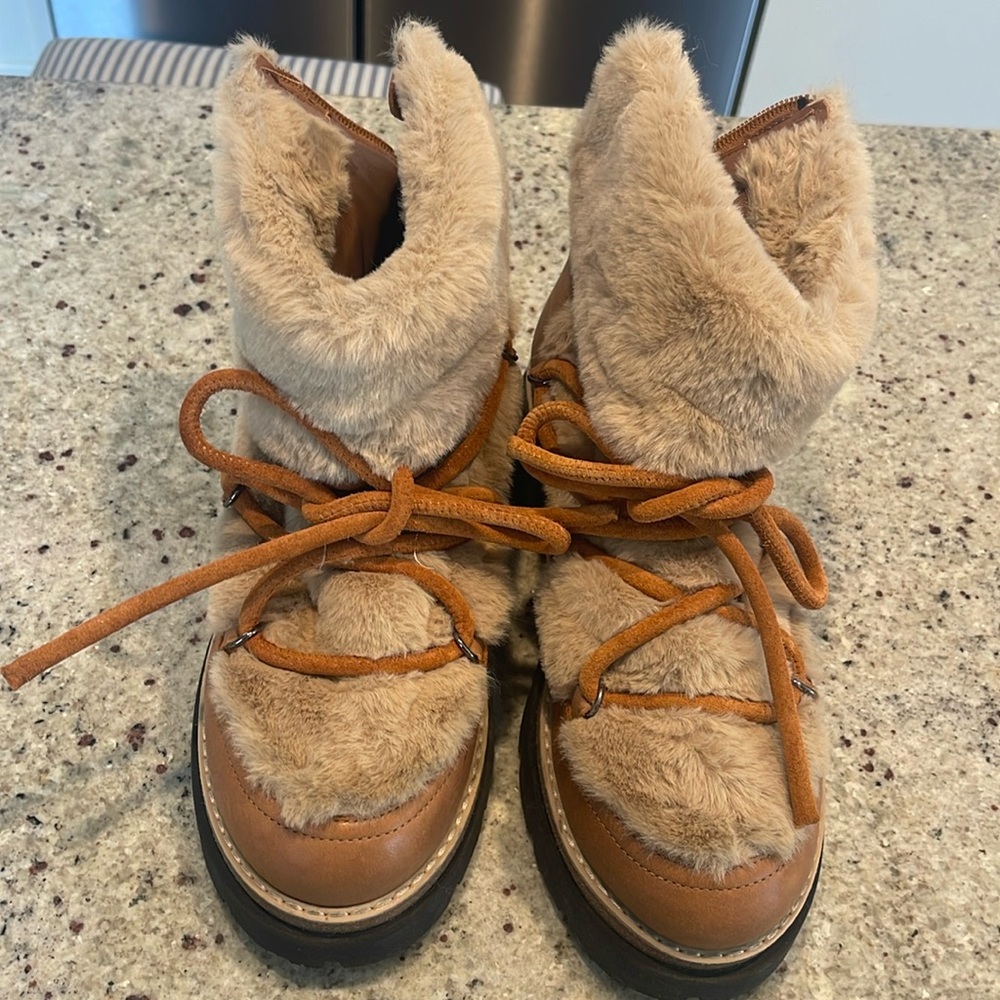 Free people boots. Zip up back rubber sole.Never worn